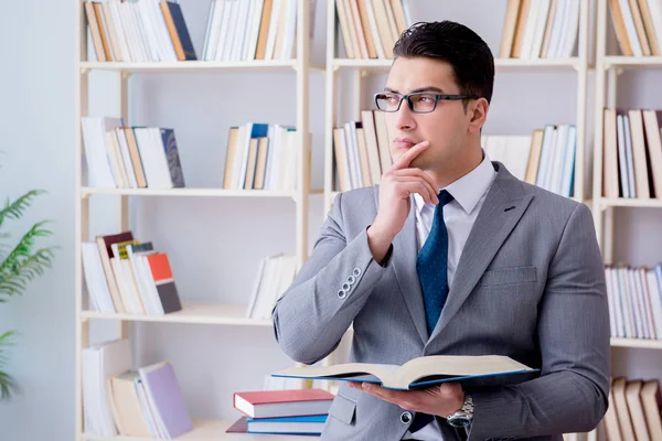 Business law student working studying in the library