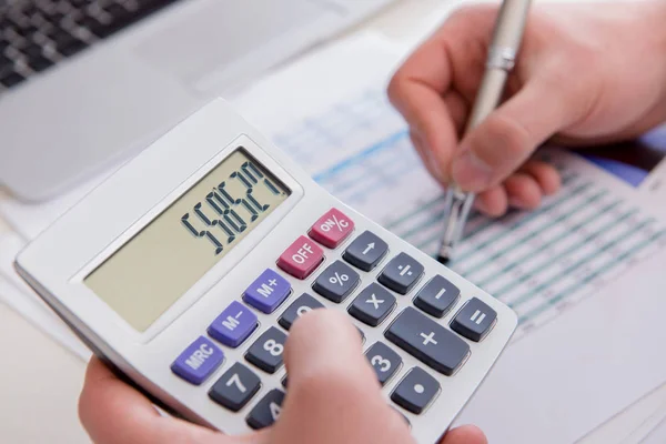 Finance analyst looking and financial reports — Stock Photo, Image