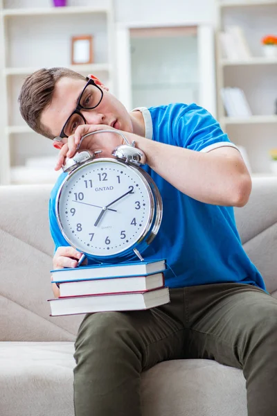 Young student preparing for exams studying at home on a sofa — Stock Photo, Image
