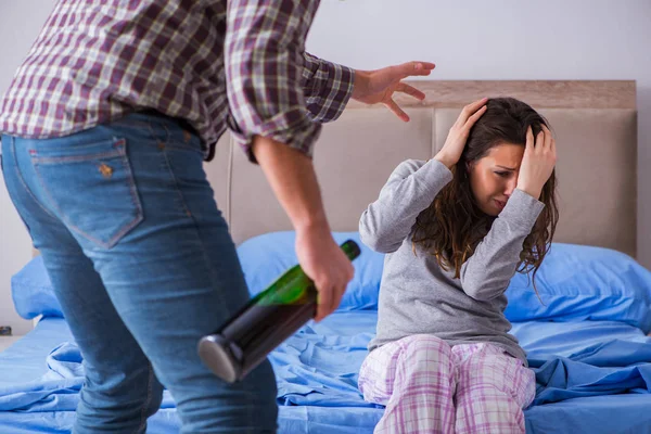 Domestic violence concept in a family argument with drunk alcoho — Stock Photo, Image