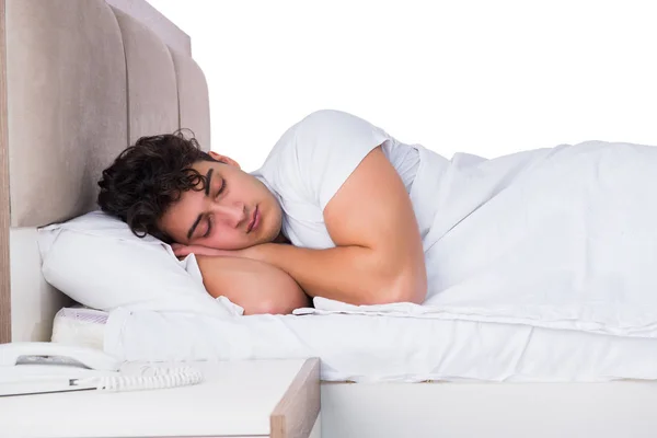 Man in bed suffering from insomnia