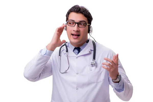 Unga läkare med telefon headset isolerad på vit — Stockfoto