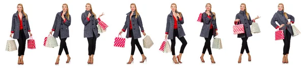 Woman with shopping bags isolated on white — Stock Photo, Image