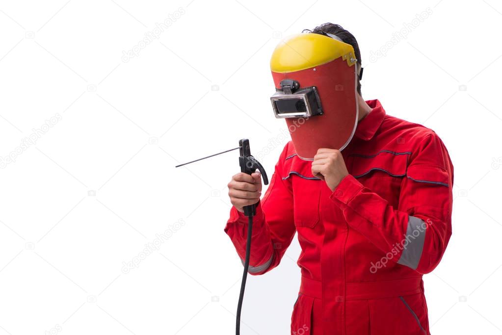 Young repairman with a welding gun electrode and a helmet isolat