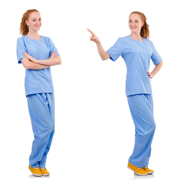 Joli docteur en uniforme bleu isolé sur blanc — Photo