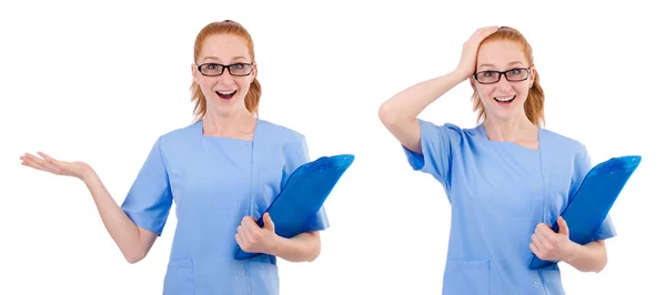 Hübsche Ärztin in blauer Uniform mit Dokumenten auf weißem Hintergrund — Stockfoto