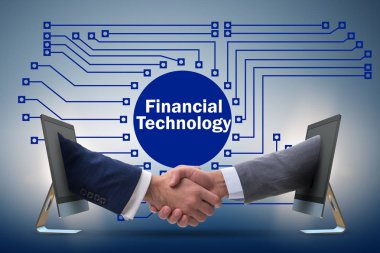 Finans teknolojisi kavramında el sıkışan iki kişi.