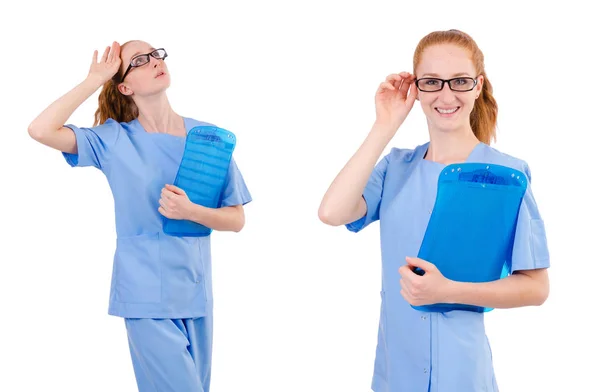 Bonito médico en uniforme azul con documentos aislados en blanco —  Fotos de Stock