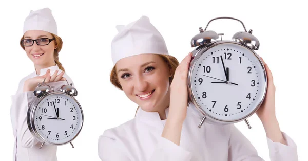 Médico mulher atraente com grande relógio isolado em branco — Fotografia de Stock