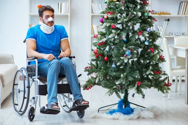 stock image Injured disabled man celebrating christmas at home