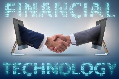 Finans teknolojisi kavramında el sıkışan iki kişi.