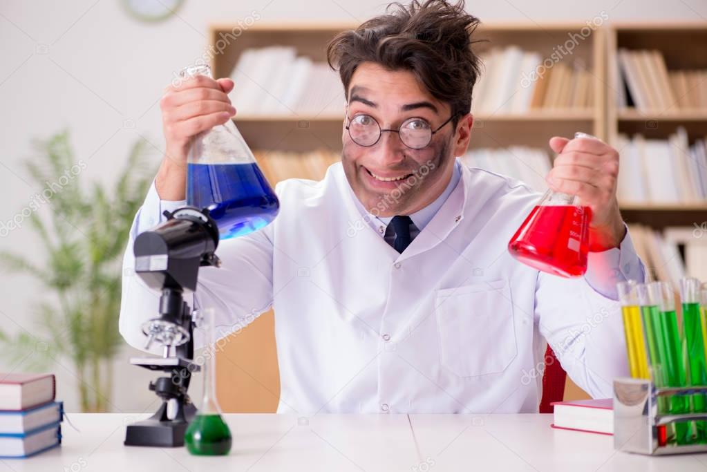 Mad crazy scientist doctor doing experiments in a laboratory