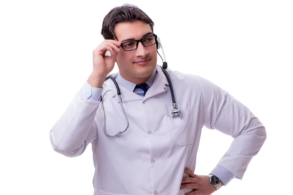 Jeune médecin avec casque de téléphone isolé sur blanc — Photo