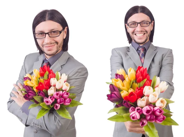 Man med blommor isolerat på vita — Stockfoto