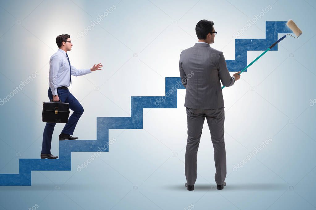 Businessman in career ladder concept