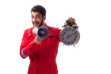 Bir megafon ve üzerinde izole bir çalar saat ile genç tamirci