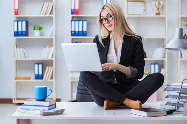 Businesswoman frustrated meditating in the office — Stock Photo, Image