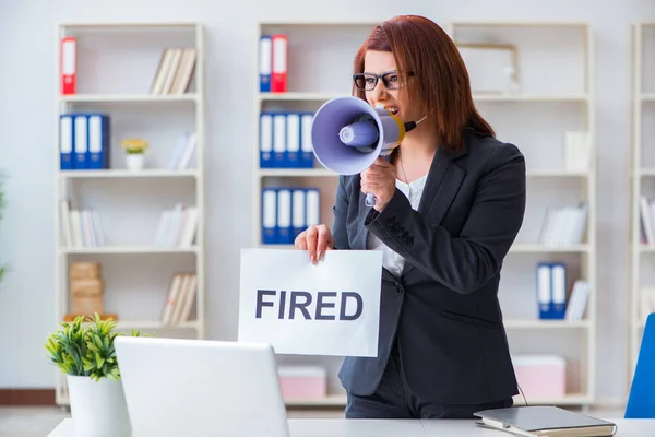 Businesswoman firing people in office — Stock Photo, Image
