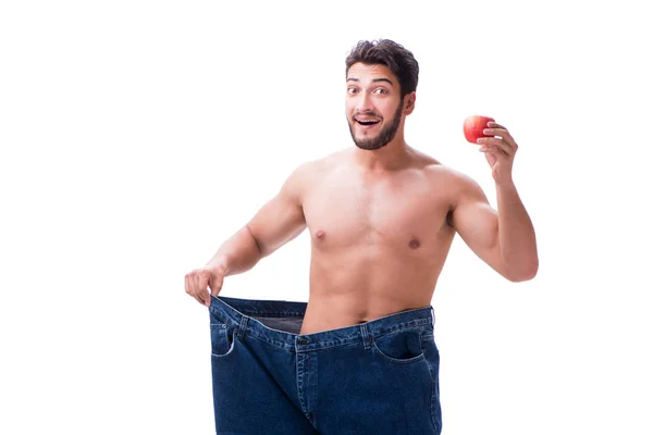 Mann im Diätkonzept mit übergroßen Jeans — Stockfoto