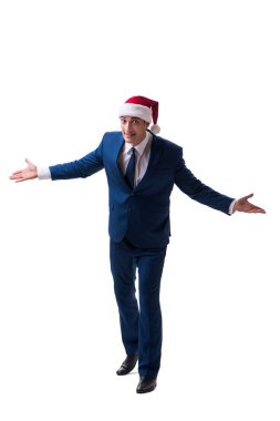 Genç busnessman Noel kavramı üzerinde beyaz Noel Baba şapkası giyiyor