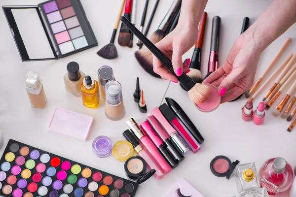 Collection of make up products displayed on the table