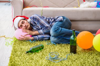 Adam noel partisinden sonra akşamdan kalma.