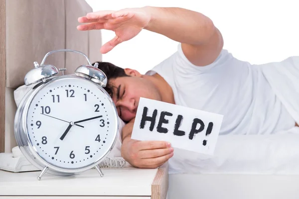 Hombre en la cama sufriendo de insomnio —  Fotos de Stock