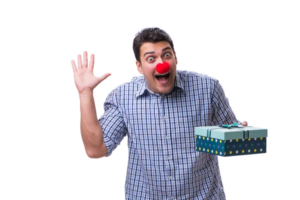 Man with a red nose funny holding a shopping bag gift present is — Stock Photo, Image