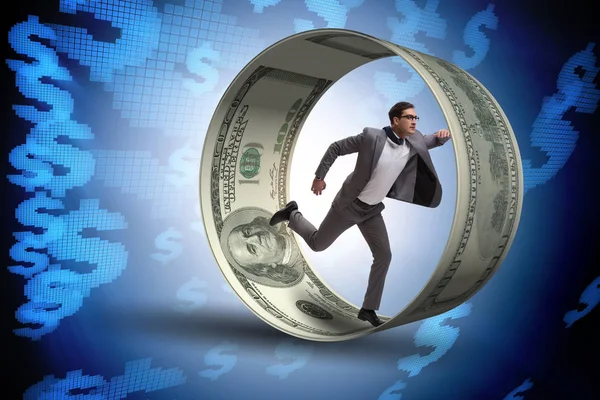 Hamster çarklı bir iş adamı dolarları kovalıyor.