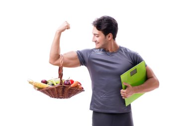 Sağlıklı beslenmenin ve spor yapmanın faydalarını destekleyen bir adam.