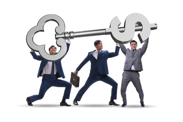 Empresários detentores de chave gigante no conceito de finanças — Fotografia de Stock