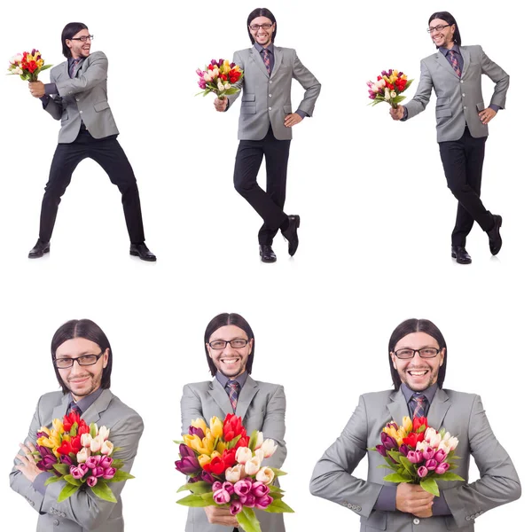 Homem com flores isoladas no branco — Fotografia de Stock