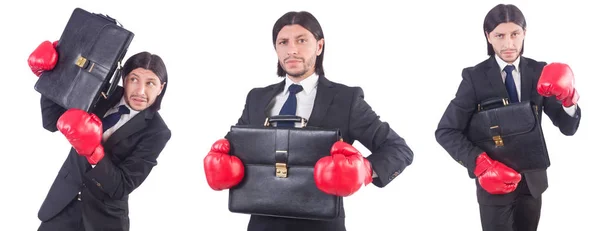 Homme d'affaires avec gants de boxe sur blanc — Photo