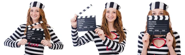 Jeune prisonnière avec plateau de cinéma isolé sur blanc — Photo