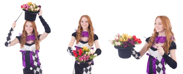 Goochelaar vrouw met bloemen op wit — Stockfoto