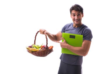 Sağlıklı beslenmenin ve spor yapmanın faydalarını destekleyen bir adam.