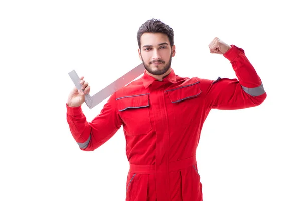 Young repairman with a square ruler isolated on white background — Stock Photo, Image