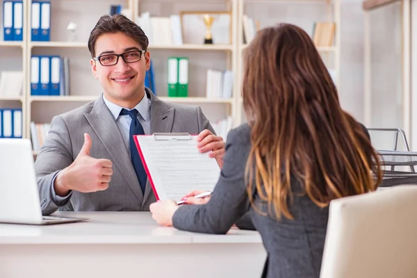 Business meeting between businessman and businesswoman — Stock Photo, Image