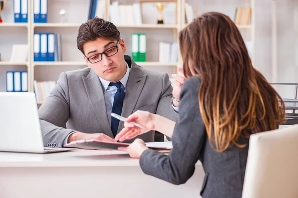 Business meeting between businessman and businesswoman — Stock Photo, Image