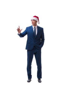 Genç busnessman Noel kavramı üzerinde beyaz Noel Baba şapkası giyiyor