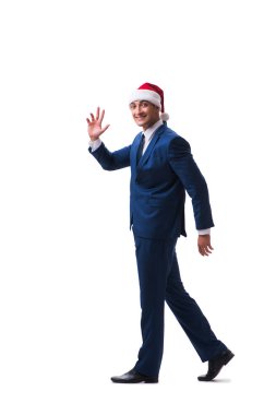 Genç busnessman Noel kavramı üzerinde beyaz Noel Baba şapkası giyiyor