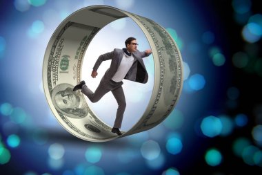 Hamster çarklı bir iş adamı dolarları kovalıyor.