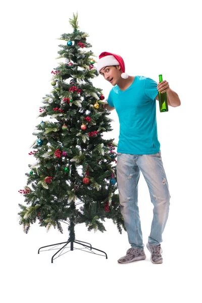 Hombre joven decorando árbol de Navidad aislado en blanco —  Fotos de Stock