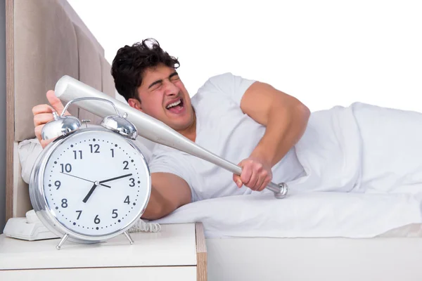 Man in bed suffering from insomnia