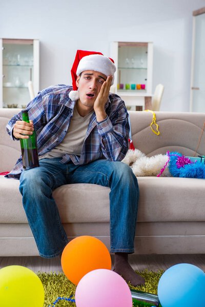 Man having hangover after christmas party