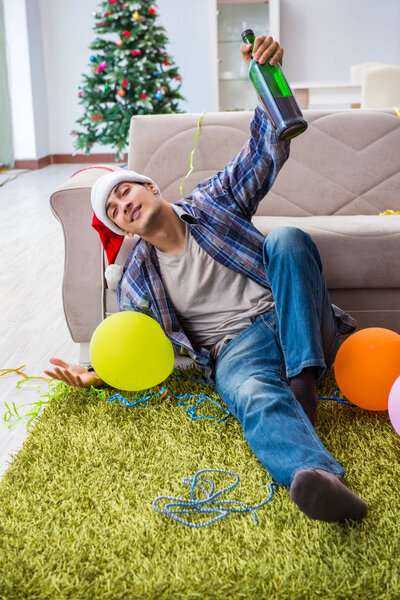 Man having hangover after christmas party