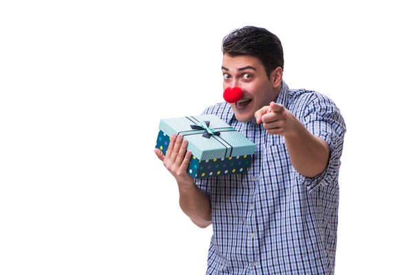 Man with a red nose funny holding a shopping bag gift present is — Stock Photo, Image