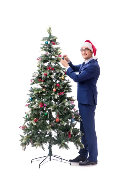 Businessman decorating christmas tree isolated on white Stock Image
