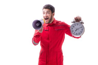 Bir megafon ve üzerinde izole bir çalar saat ile genç tamirci