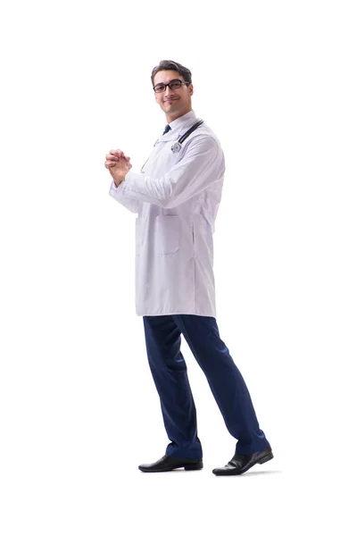 Médico joven de pie caminando aislado en blanco backgr — Foto de Stock